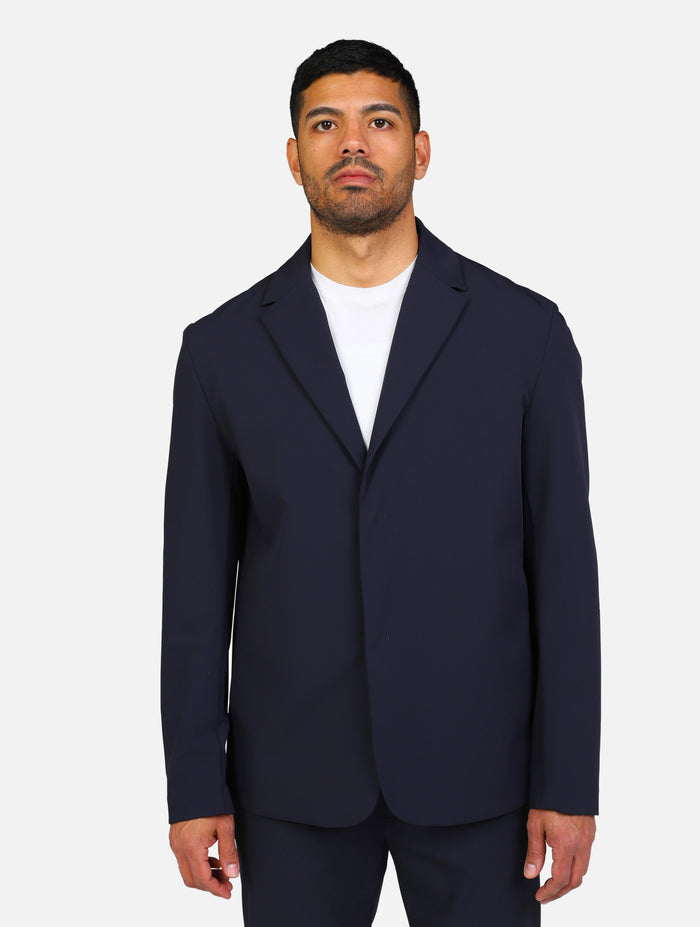 art. bl-blazer tech-ss25: giacca blazer monopetto con tasche a taglio e due bottoni