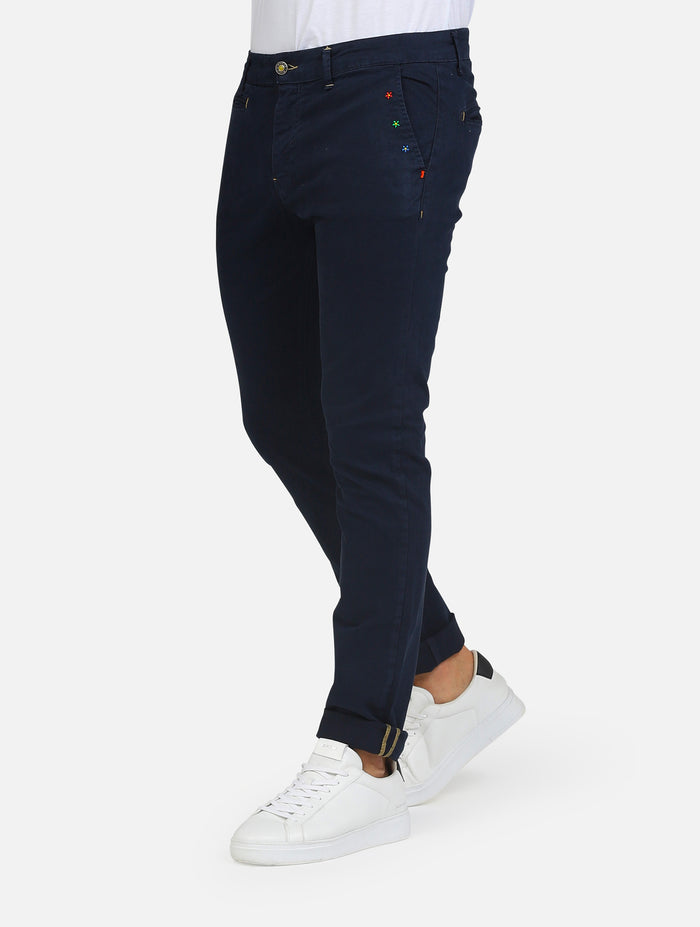 pantalone classico con tasche a taglio con ricami floreali e chiusura zip