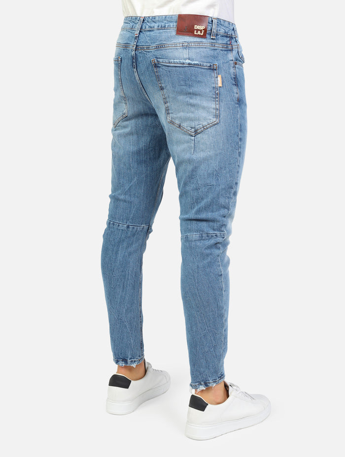 jeans leggermente elesticizzato con cuciture, abrasioni e rotture