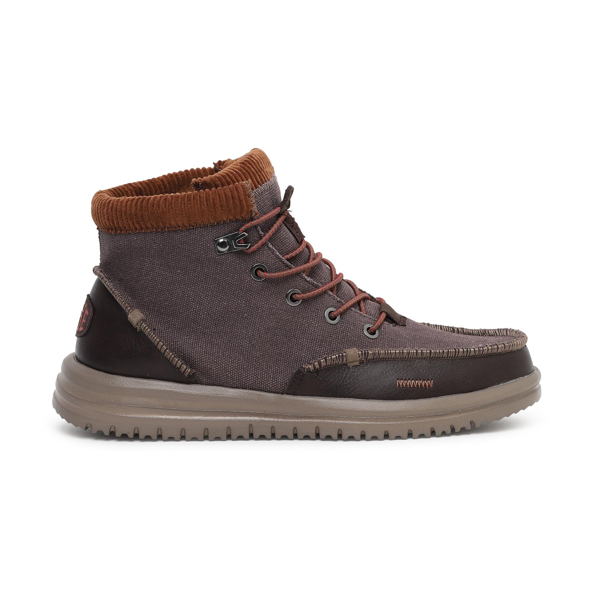 Con la tomaia in tela cerata e il velluto a coste su rivestimento interno e collo, questi stivali sono il giusto mix tra stile e comfort; calzata rapidissima brown-multi uomo 