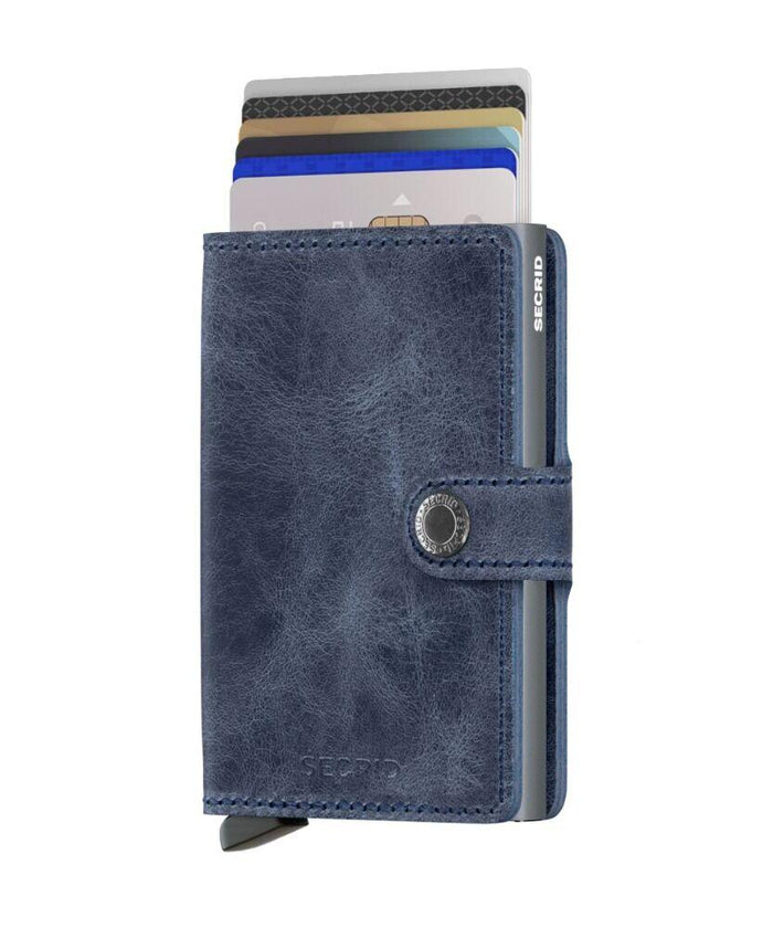 grazie al profilo sottile, piccolo ma capiente, il miniwallet calza in tutte le tasche: esterno progettato per carte, banconote ricevute; carte estrai