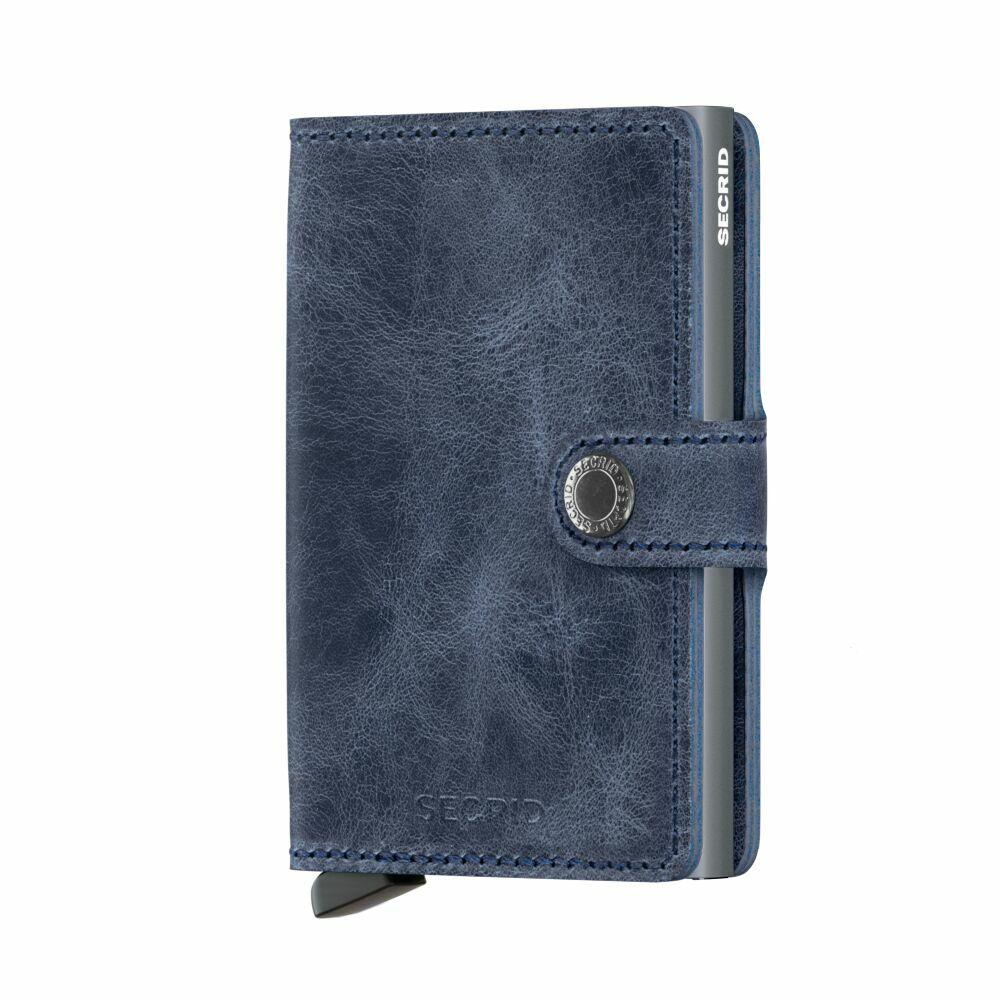 grazie al profilo sottile, piccolo ma capiente, il miniwallet calza in tutte le tasche: esterno progettato per carte, banconote ricevute; carte estrai