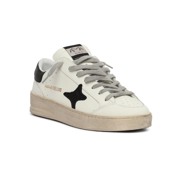 sneakers in pelle e camoscio con logo