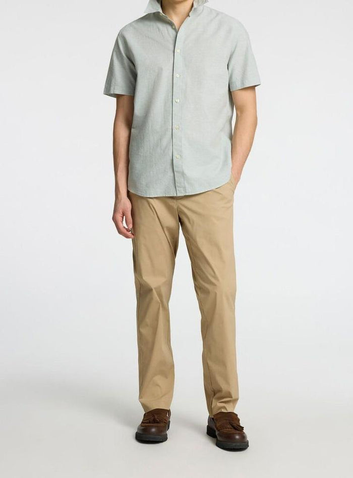 art. 16094570: pantalone regular tapered leroy flex con tasche a taglio