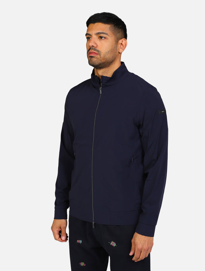 art. cg-ruiz ultra-ss25: giacchetto collo alto, maniche lunghe con polsini elasticizzati, chiusura zip, tasche frontali zip, patch logo sulla manica